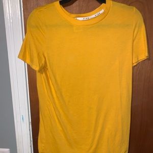 Nice short sleeve yellow shirt , never worn.